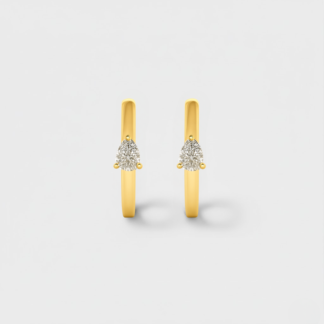 phoebe-pear-diamond-huggue-earrings-yellow-gold1.png Phoebe 9ct Yellow Gold Lab Diamond Pear Huggie Earrings - Image 1